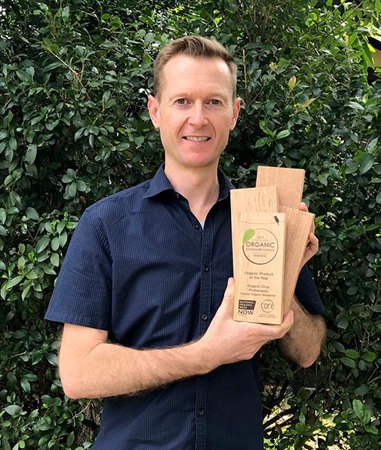Steve Falcioni, General Manager, with the Organic Product of the Year award from the 2017 Organic Consumer Choice Awards